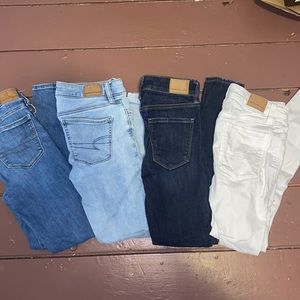 4 pairs of American eagle jeans